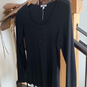 Black stretchy long sleeve basic. Runs tight